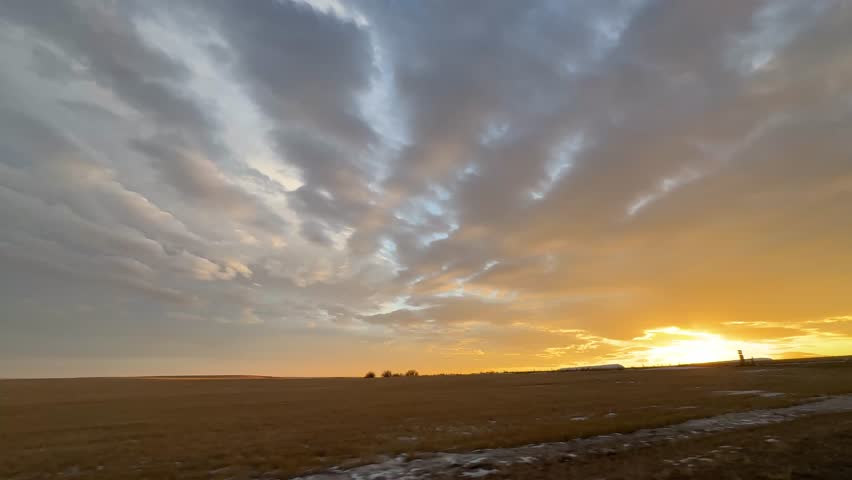 Driving Past Scenic Alberta Farmland In Early Spring