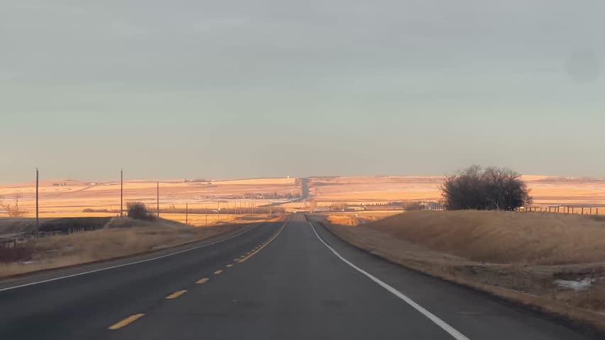 Driving Down Scenic Rural Highway In Western Alberta