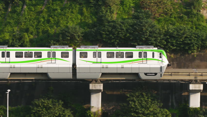 Unique Engineering With Monorail Train Of The Liziba Station In Chongqing, China. Aerial Tracking Shot