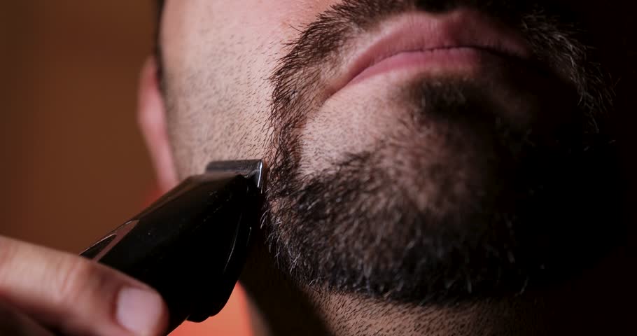 Man Trimming His Beard with Electric Shaver, Male Grooming and Personal Care