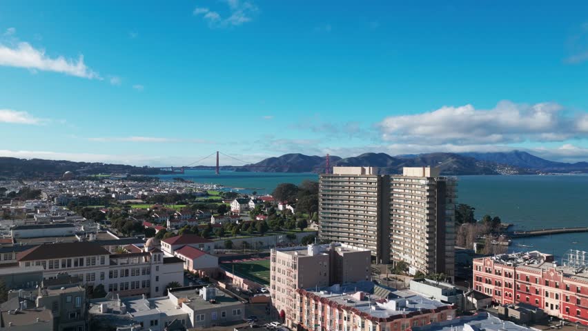 Wide rising aerial shot of the Golden Gate Bridge on a perfectly clear day in San Francisco, California. 4K