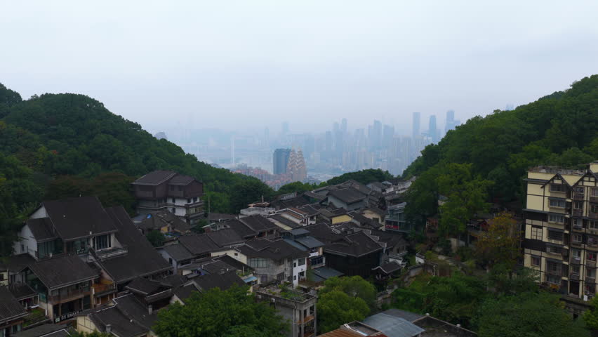 Huangjueya Old Street With The Modern Skyline Of Chongqing
