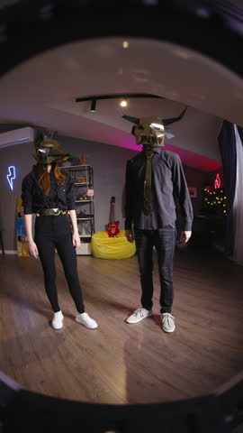 Short form dance challenge virtual idol fan cam UGC content gold animal masks trend modern teen duo performing stylish choreography creator economy