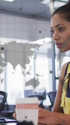 Animation of world map, globe and data over casual businesswoman using computer at office. Business, data, network, digital interface and global communication, digitally generated video.