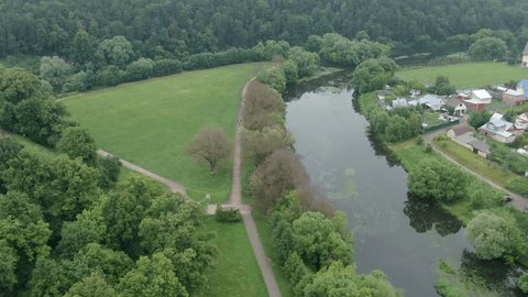 Aerial Drone Flight above Forest River