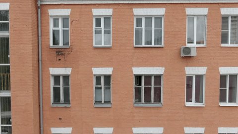 Aerial Flight along Apartment Building Facade