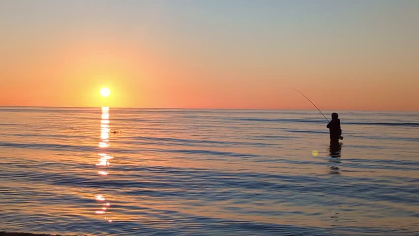 Sea fishing at sunrise on the Danish Baltic Sea coast