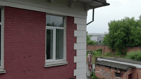 Drone Flying Close Red Brick Building