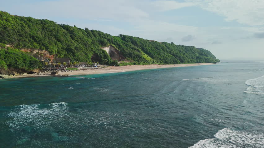 Above view of coastal landscape with ocean waves, beach coastline