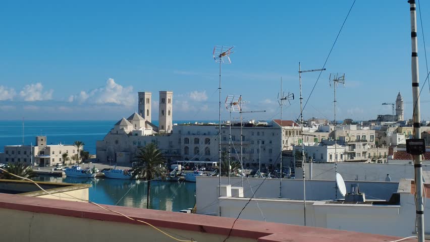 Molfetta naval port with a view of the cathedral