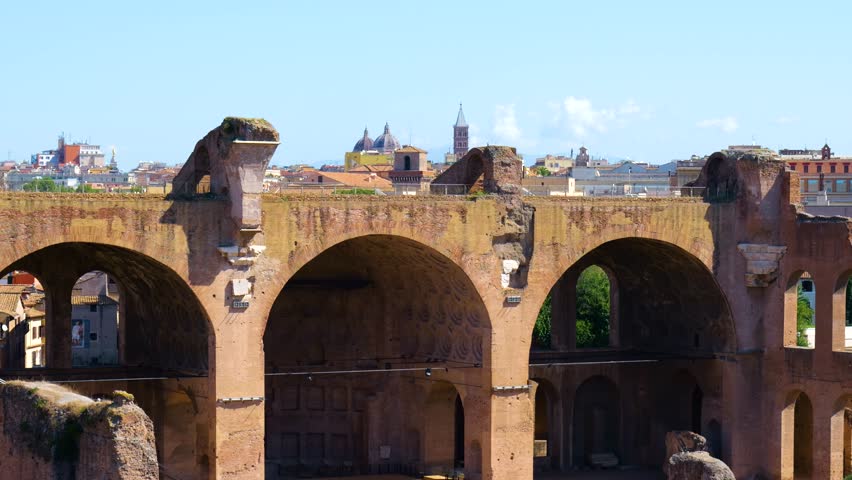 massive brick arches partially preserved coffered vaults basilica maxentius stand rome’s skyline domed churches visible background rome italy coffer of