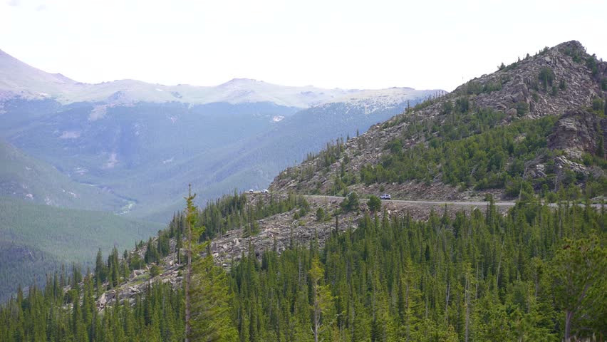Cars passing through the most scenic drive of Trail Ridge Road in Rocky Mountain National Park, Colorado.