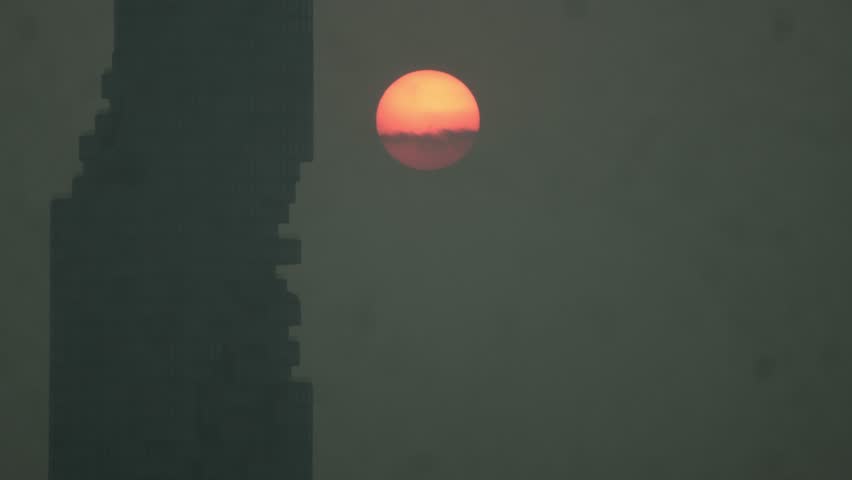 Cityscape of Bangkok covered by mixture of dust in air pollution. Heavy air pollution of fine particulate matter (PM2.5) in morning.