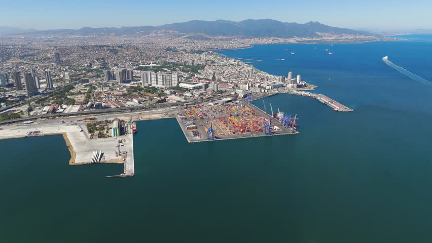 Izmir, Turkey. Aerial panoramic view of Izmir Port and Alsancak cruise terminal with city skyline and Kordon promenade on sunny summer day. Aerial view