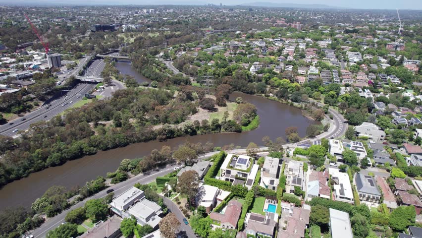 Drone view on a sunny day of Loys Paddock and th Citylink freeway along the Yarra River in Melbourne, Victoria, Australia. December 2025