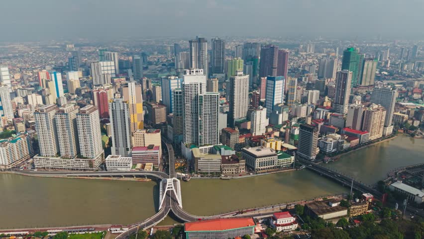 Wide Aerial Panorama Of Binondo Cityscape And River Manila Philippines