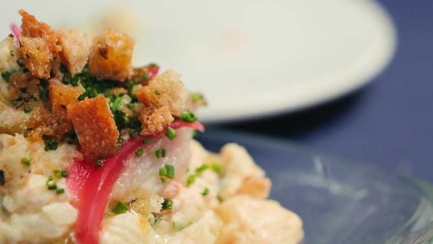 Spanish style russian salad, Ensalada Rusa. Olivier salad restaurant cuisine in Spain.