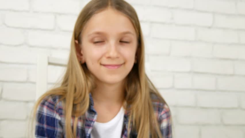 Kid Birthday Party, Child Blowing Candles, Girl with a Cake as Gift for her Anniversary, Family, Children Celebration