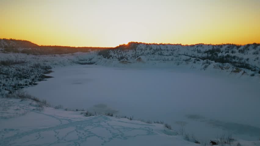 Snowy Landscape at Sunrise with Aerial View.