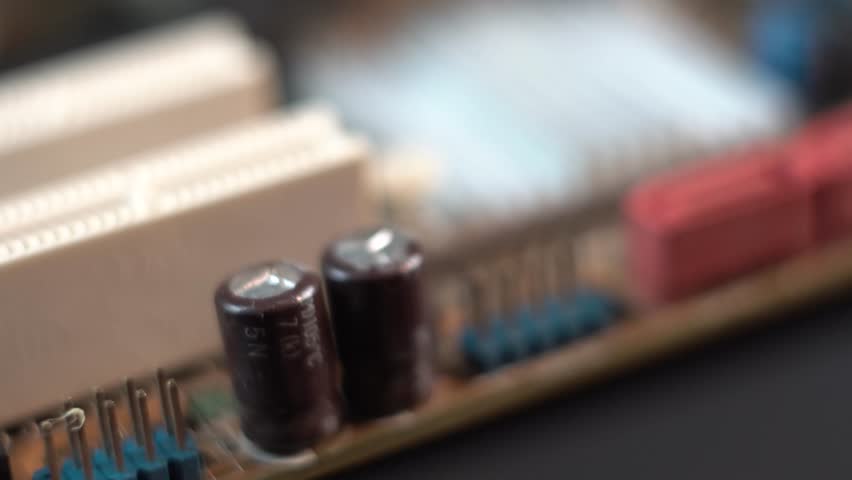 Computer Motherboard Macro Close Up. Sockets, Electronic Components and Processor Cooler