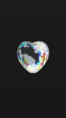 Rotating heart shaped diamond. 3D render love concept for Valentines day. Black background. 4k vertical looped animation.