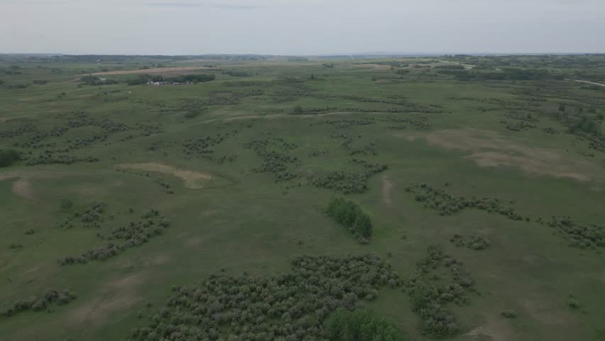 Drone perspective on calm summer day in Alberta prairies