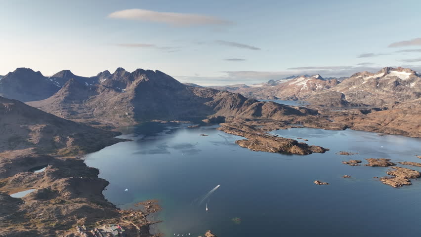 Misty Mountains Over Tasiilaq Village and Fjord in the Arctic, Greenland