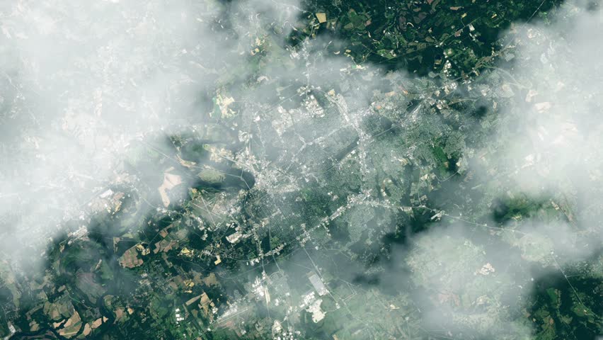 Flying over Montgomery Alabama satellite view with passing clouds based on Nasa imagery