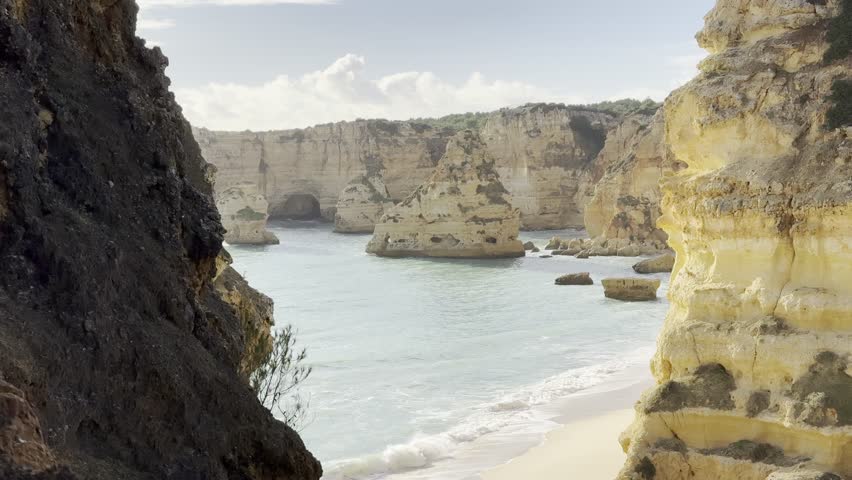 Pau Beach (Praia do Pau) is just east of the renowned Marinha Beach and is only accessible by sea as it is surrounded by coastal cliffs.