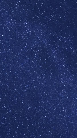 Time‑lapse of the Milky Way and moonrise over a majestic mountain landscape at night, revealing stars, galaxies and shifting light in a tranquil, awe‑inspiring natural scene.