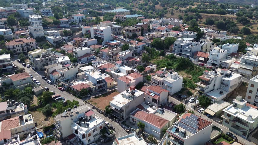 Chios town, Chios island, Greece - July 24th, 2025 - footage of the the capital of the island, windmills, mosque, castle, harbor, cityscape, Aegean sea, apartment buildings, churches, Ottoman heritage and mountains behind
