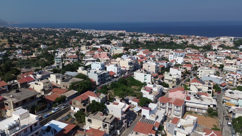 Chios town, Chios island, Greece - July 24th, 2025 - footage of the the capital of the island, windmills, mosque, castle, harbor, cityscape, Aegean sea, apartment buildings, churches, Ottoman heritage and mountains behind