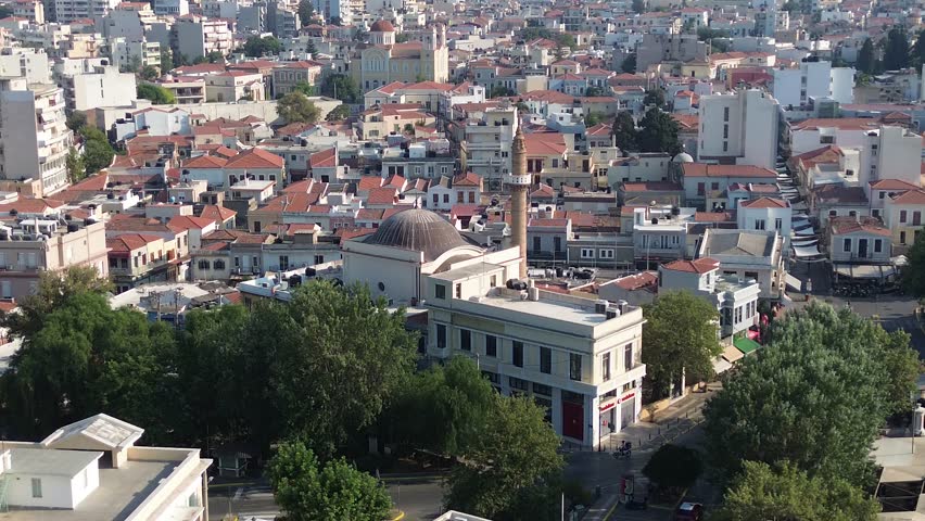 Chios town, Chios island, Greece - July 24th, 2025 - footage of the the capital of the island, windmills, mosque, castle, harbor, cityscape, Aegean sea, apartment buildings, churches, Ottoman heritage and mountains behind