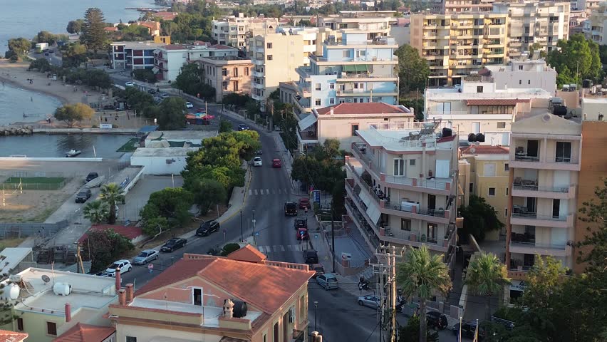 Chios town, Chios island, Greece - July 24th, 2025 - footage of the the capital of the island, windmills, mosque, castle, harbor, cityscape, Aegean sea, apartment buildings, churches, Ottoman heritage and mountains behind