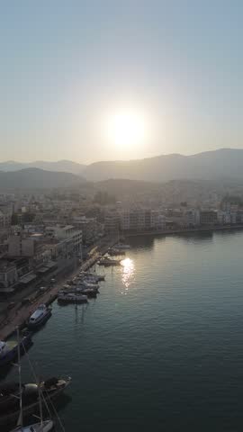 Chios town, Chios island, Greece - July 24th, 2025 - footage of the the capital of the island, windmills, mosque, castle, harbor, cityscape, Aegean sea, apartment buildings, churches, Ottoman heritage and mountains behind