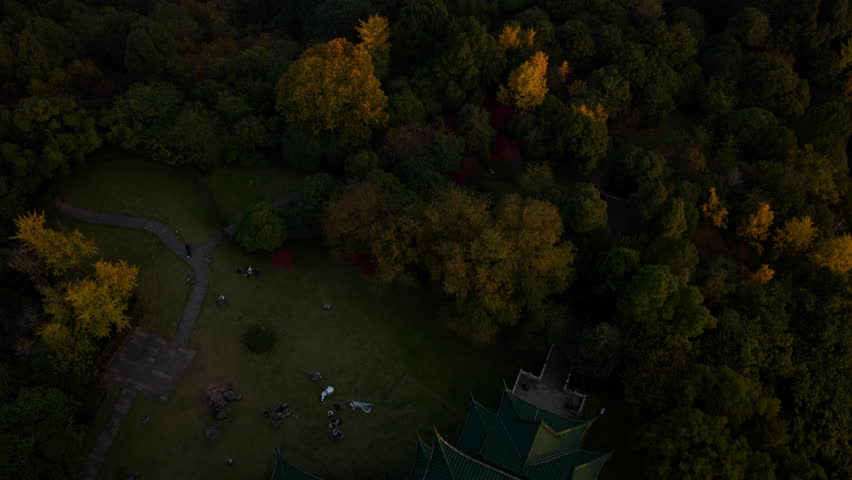 Hilltop Hongen Pavilion Historic Structure At Sunset In Chongqing, China. Aerial Tilt-up Pullback Shot