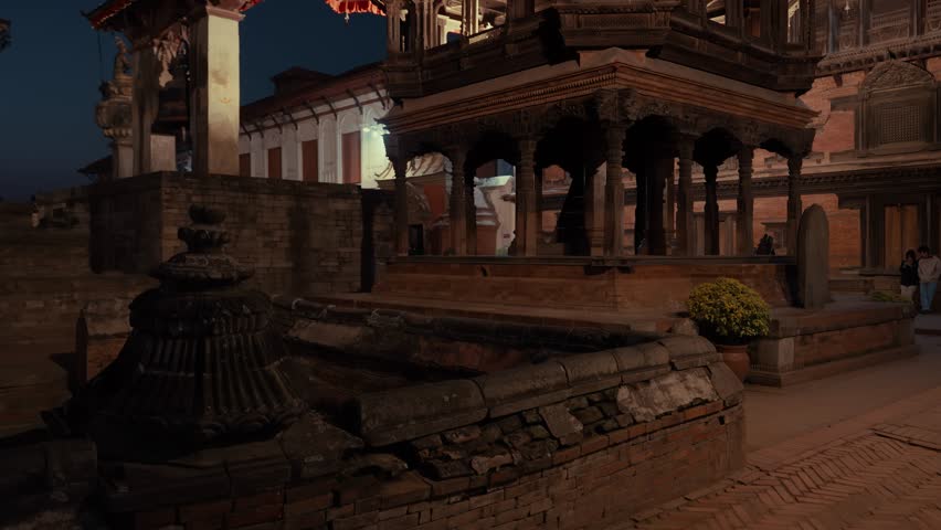 Historic wooden carving temple architecture of Bhaktapur Durbar Square by night. Kathmandu, Nepal