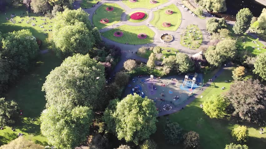 Aerial look over St Stephens Green park to Dublin cityscape during summer day in Ireland.