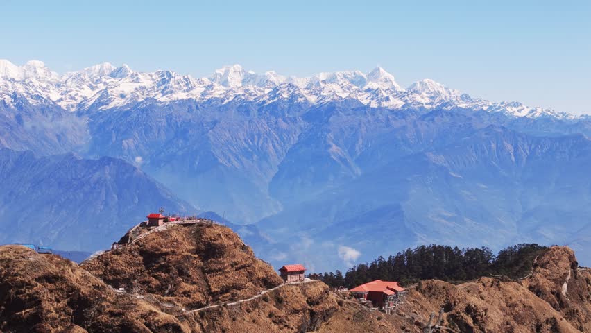 Aerial view of Kalinchowk Bhagawati Temple in Dolakha shows Himalayan mountains and green hills in Nepal