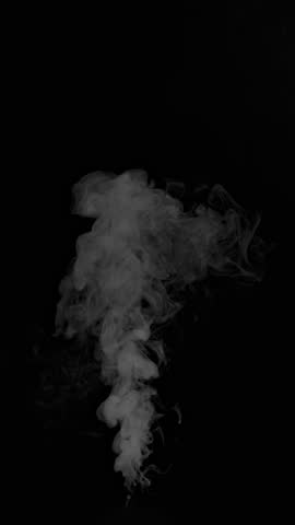 Slow Motion Shot of Slowly Rising Steam, Isolated on Black Background.