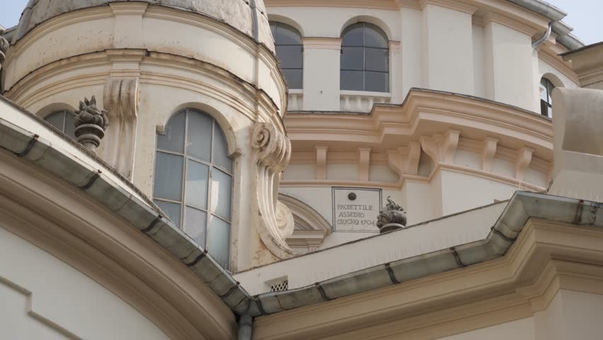 Santuario della Consolata cannonball stuck in wall