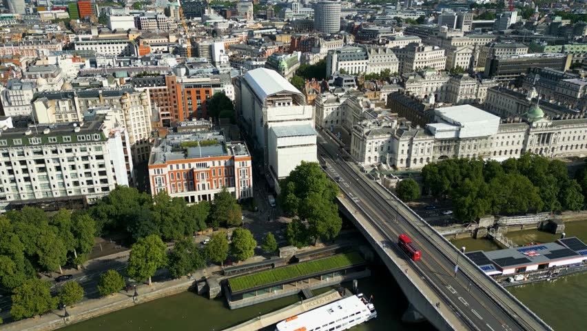 Aerial View of London over the River Thames and City Buildings