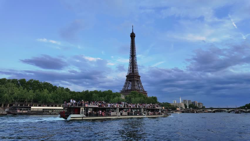 Timelapse of Eiffel Tower in Paris in the Evening with Illuminated Lights