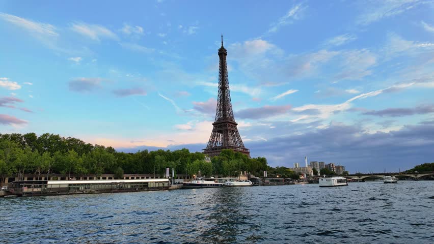 Timelapse of Eiffel Tower in Paris in the Evening with Illuminated Lights