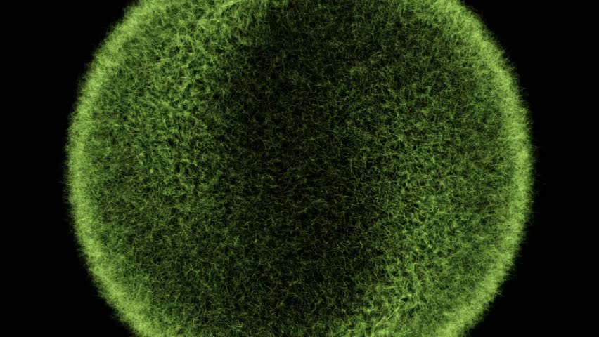 A glowing green circular object with a fuzzy texture floats against a black background, creating a striking abstract visual.