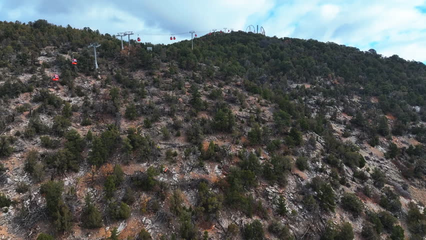 Aerial vew following gondolas up to the Amusement park in Glenwood springs, USA