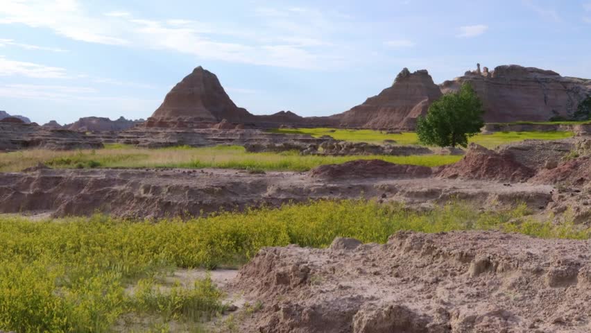 Open Prairies and rock formations in Badlands National Park.