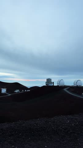 Vertical pan shows access roads leading to the Mauna Kea observatories