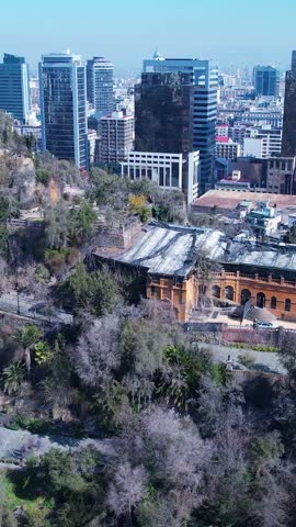 Aerial landscape of Santiago Chile near Andes Mountains. Touristic landmark. City life scenery Santiago Chile. Travel destinations. Vacations travel. Cityscape of Santiago Chile.