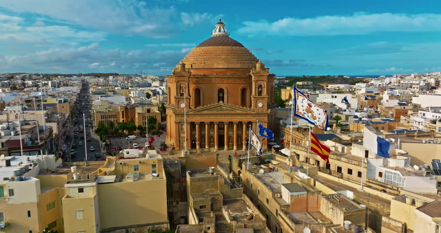 Aerial view of Mosta Church, famous remarkable wartime miracle, architectural landmarks, Malta 